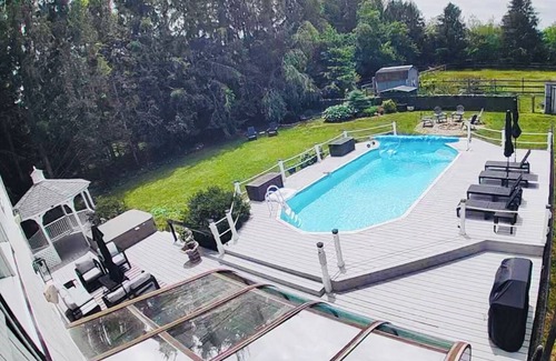 Cutchogue Casa | Spacious and Renovated Summer Home with w/ Pool & Hot tub