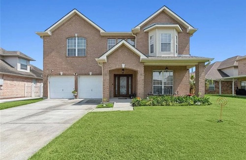 Braithwaite Casa | Spacious comfortable King room. Work-friendly. High-speed internet w/ 50" TVs