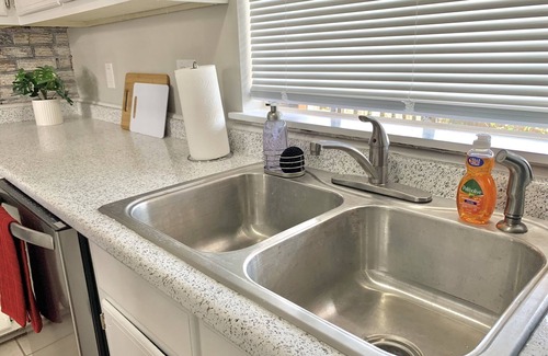 Tougaloo Condominio | Spacious Condo w/ Patio! Near Mall & Reservoir w/ Garage & Outdoor Games