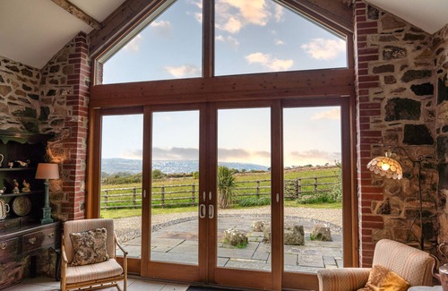 Fishguard Casa | Spacious converted rural barn. Sea views, large grounds, family & pet friendly.