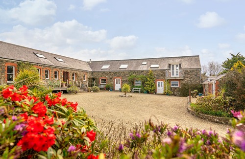 Fishguard Casa | Spacious converted rural barn. Sea views, large grounds, family & pet friendly.