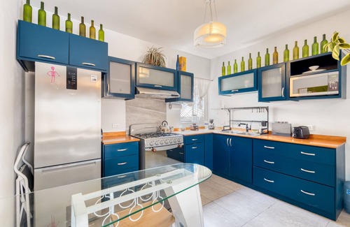 El Centenario Casa | Spacious home with private pool, garden, and washer/dryer