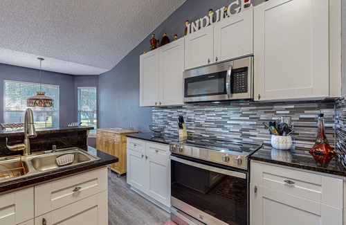 Indian Trails Casa | Spacious home with saltwater pool, gas grill, patio, & washer/dryer