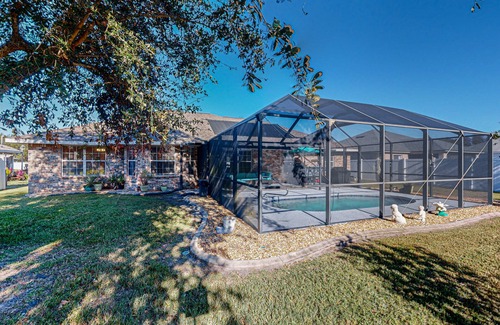 Indian Trails Casa | Spacious home with saltwater pool, gas grill, patio, & washer/dryer