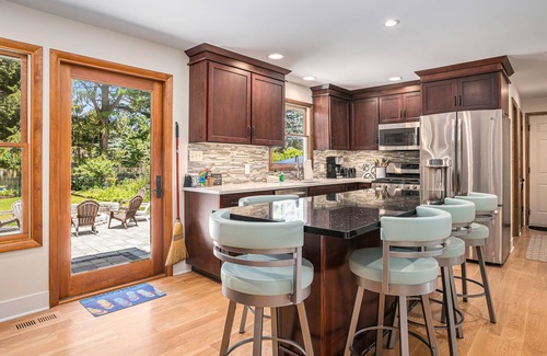 Macatawa Casa | Spacious house with private pool, badminton, cornhole, firepit, grill, and WiFi