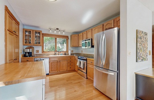 Lucerne-in-Maine Casa | Spacious Lakefront Home with a Sandy Beach, Kayaks, and Stunning Panoramic Views