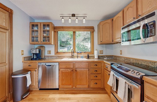 Lucerne-in-Maine Casa | Spacious Lakefront Home with a Sandy Beach, Kayaks, and Stunning Panoramic Views