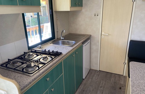 Viareggio Chalet De Esquí | Spacious mobile home, with veranda, on the family camping Paradiso