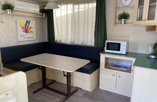 Viareggio Chalet De Esquí | Spacious mobile home, with veranda, on the family camping Paradiso