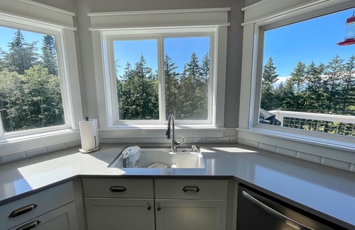 Eastsound Casa | Spacious & modern house with game room, outdoor firepit & peek-a-boo water views
