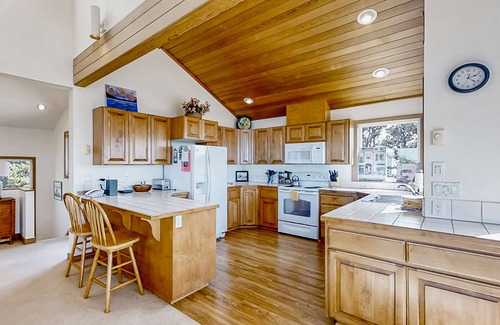 South Beach Casa | Spacious oceanfront home with free WiFi, fireplace, and wrap-around deck