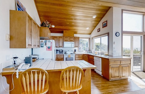 South Beach Casa | Spacious oceanfront home with free WiFi, fireplace, and wrap-around deck