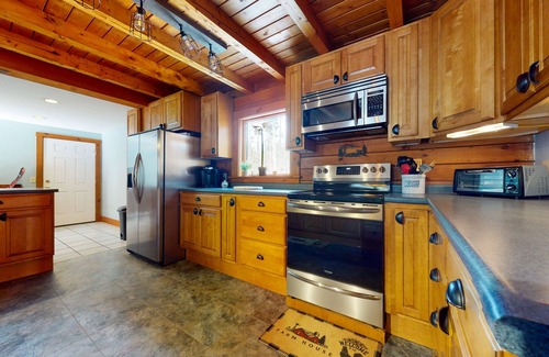 Chester Casa | Spacious retreat with private hot tub, game room, deck, fireplace, & W/D