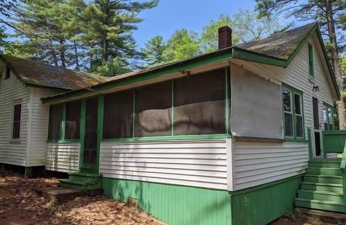 Raymond Cabaña | Spacious, Rustic Retreat with a Large Screened Porch and Water Access