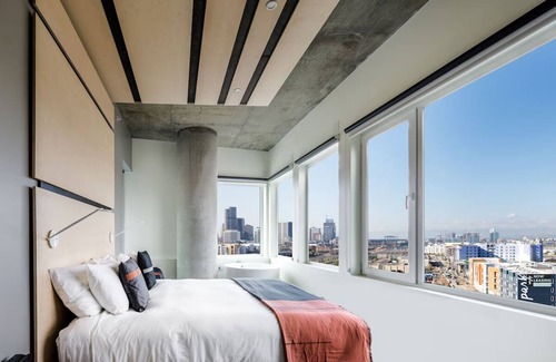 River North Art District Hotel | Spacious Suite with Stunning Market Views, Chic Decor, and Modern Amenities