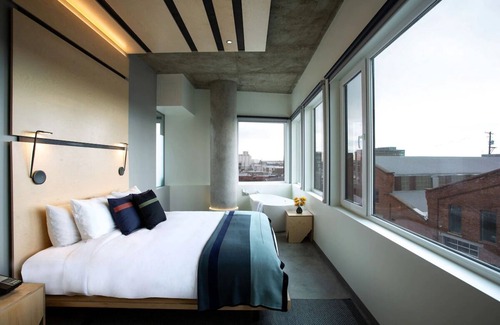 River North Art District Hotel | Spacious Suite with Stunning Market Views, Chic Decor, and Modern Amenities