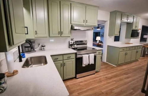 Covington Casa | Spacious, Town Square, Theatre Room! 4 bed / 2 bath Private Home on town square
