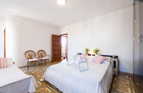Maddalenedda Casa | Spazioso Appartamento al Mare con Giardino T0520