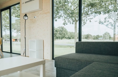 Ouddorp Cabaña | Specially designed chalet with dishwasher, in a holiday park near the sea