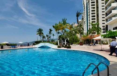 Lomas de Costa Azul Apartamento | Espectacular departamento a pie de playa