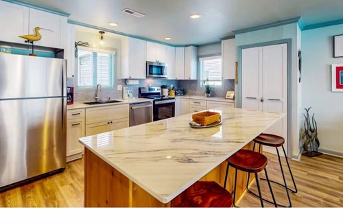 Indian Beach Condominio | Spectacular partial ocean view 2BR 2BA large top floor condo-beachfront complex!