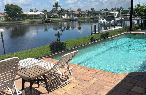 Punta Gorda Casa | HERMOSA VISTA DE CANAL INTERSECTANTE ANCHA CON PISCINA DE AGUA SALADA