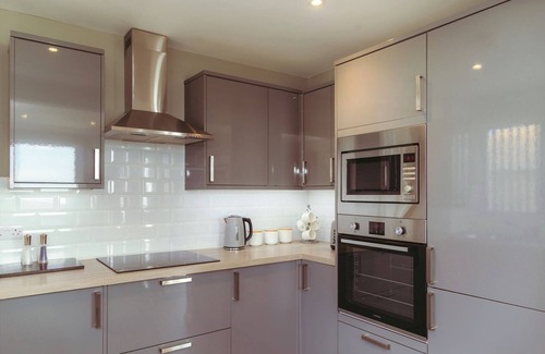 Pevensey Apartamento | Apartamento de dos niveles en primera línea de playa con increíbles vistas al mar