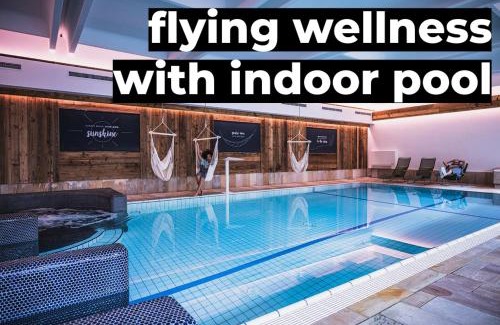 Kaprun Hotel | Sport & Wellness Hotel Das Falkenstein - Natural Swimming Lake - Matrix GYM - Summercard inklusive - Authentic experience - Flying wellness with Pool