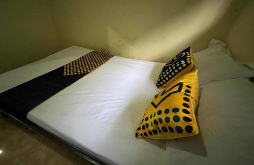 Dinoyo Hotel | SPOT ON 93621 Kost Bu Tutik Syariah
