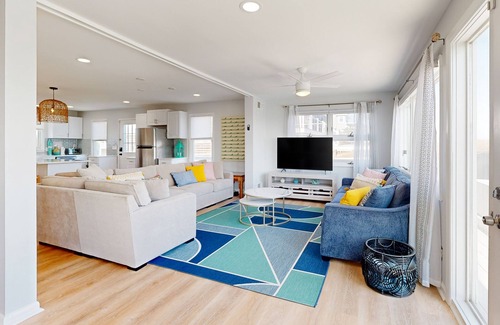 Prime Hook Beach Casa | Sprawling beachfront home with alfresco dining, grill, games, W/D, & open layout
