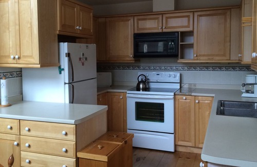 Sandwich Casa | Lago Squam: casa frente al mar con gran porche con mosquitero