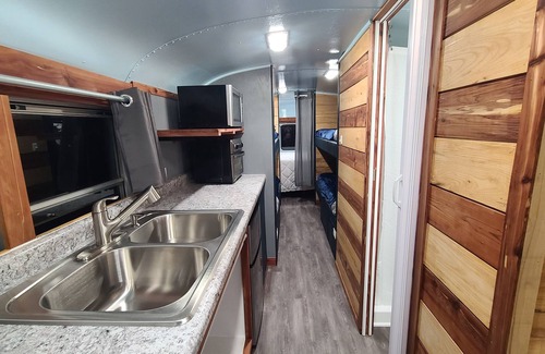 Eddyville Casa | Stationary renovated local school bus. Inquire about our hunter specials!
