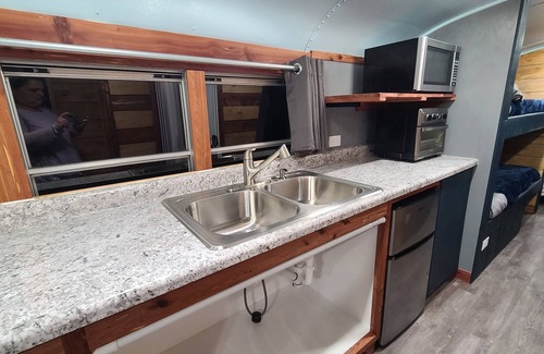 Eddyville Casa | Stationary renovated local school bus. Inquire about our hunter specials!