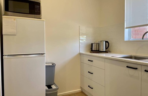 Turvey Park Apartamento | Stay in charming apartment in Grandview Building, Turvey Park. Free Wifi.