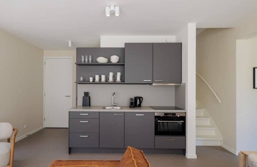 Oude-Tonge Casa | Stay in comfort in this modern, recently built holiday home with a beautiful view of the water from