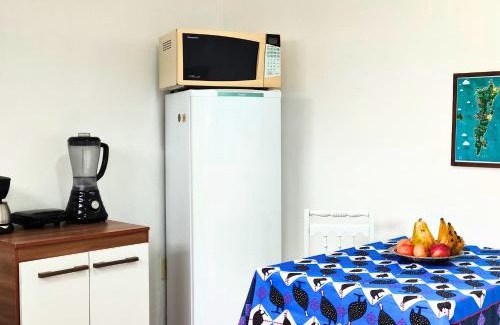 Rio Vermelho Norte Casa | StayBr Floripa - Studio Cravo e Canela - Aconchego e privacidade, ideal para casais, com cozinha completa, ar-condicionado, Wi-Fi, vaga de garagem, excelente custo benefício, lugar tranquilo entre as praias dos Ingleses e Moçambique