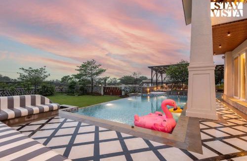 Kurvande Villa | StayVista at Solace Land with Bonfire, Jacuzzi