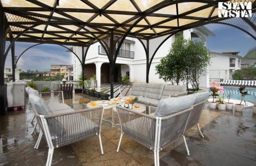 Kurvande Villa | StayVista at Solace Land with Bonfire, Jacuzzi