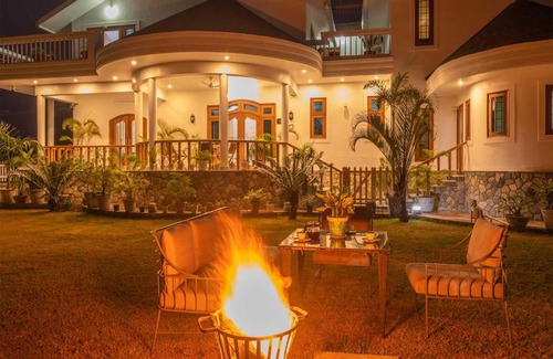 Bullawala Villa | StayVista at The Willowfield with BBQ Grill & Bonfire