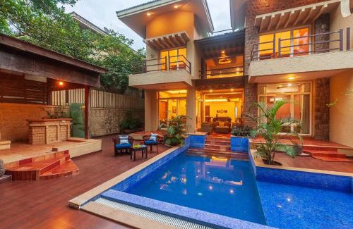 Kune Village Villa | StayVista's The Happy Hive - Cozy rooms and a pool for a delightful stay