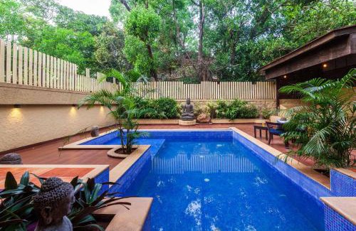 Kune Village Villa | StayVista's The Happy Hive - Cozy rooms and a pool for a delightful stay