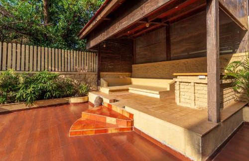 Kune Village Villa | StayVista's The Happy Hive - Cozy rooms and a pool for a delightful stay