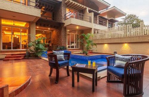 Kune Village Villa | StayVista's The Happy Hive - Cozy rooms and a pool for a delightful stay