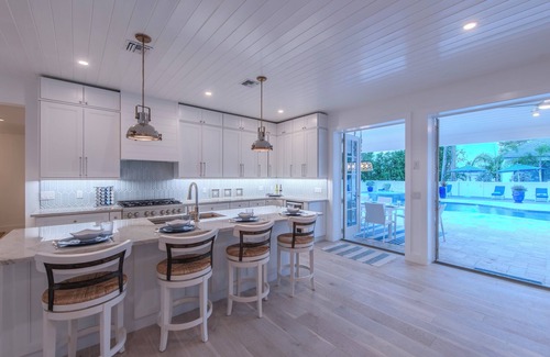 Connors Casa | Steps to Vanderbilt Beach, Sleeps 13, Resort-Style Backyard
