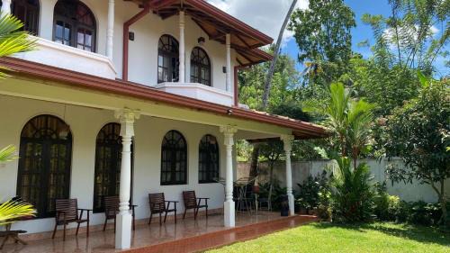 Harispattuwa Casa | Stone Arch Villa A Timeless Retreat with a Free Kandy Lake Boat Tour