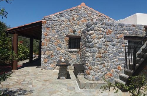 Galatas Casa | Stone house among trees