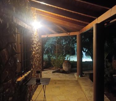 Galatas Casa | Stone house among trees