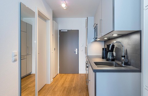 Bensersiel Apartamento | Strandnahes 1-zimmer Apartment mit Balkon, Parkplatz, Schwimmbad- & Saunanutzung