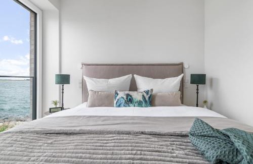 Olpenitz Apartamento | Strandfeder – Moderne Ostsee-Ferienwohnung für Drei im OstseeResort Olpenitz