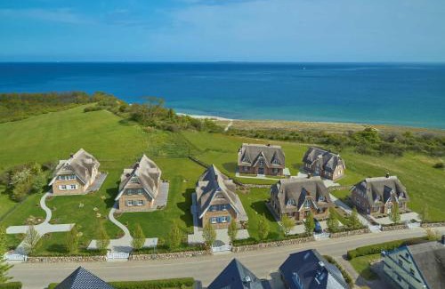 Lobbe Villa | Strandhaus "Oie" in Lobbe mit Meerblick, Kamin, Sauna